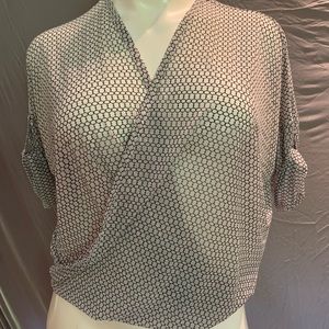 Jennifer Lopez Vneck Blouse; sheet